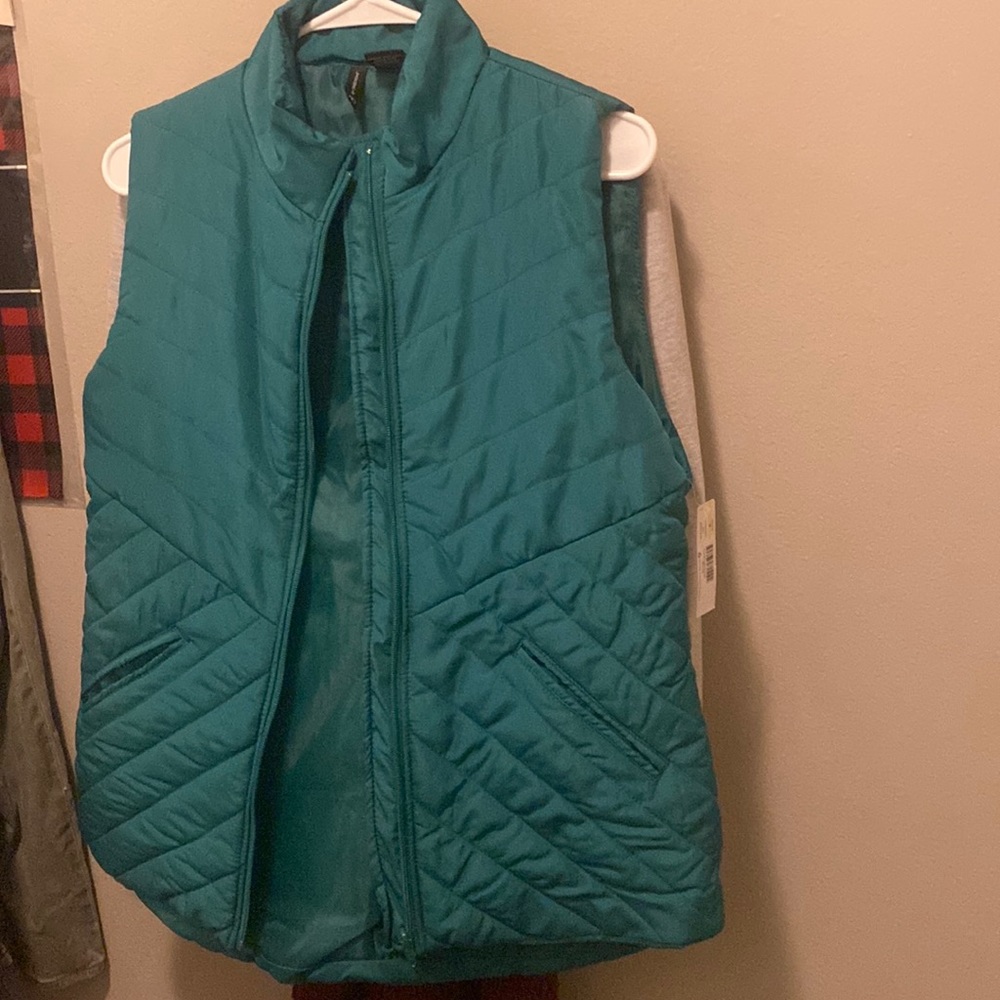 Green puffer vest - never worn - tags still on